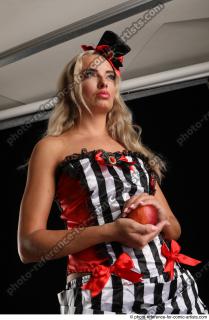 CHRISTY STANDING POSE WITH RED APPLE